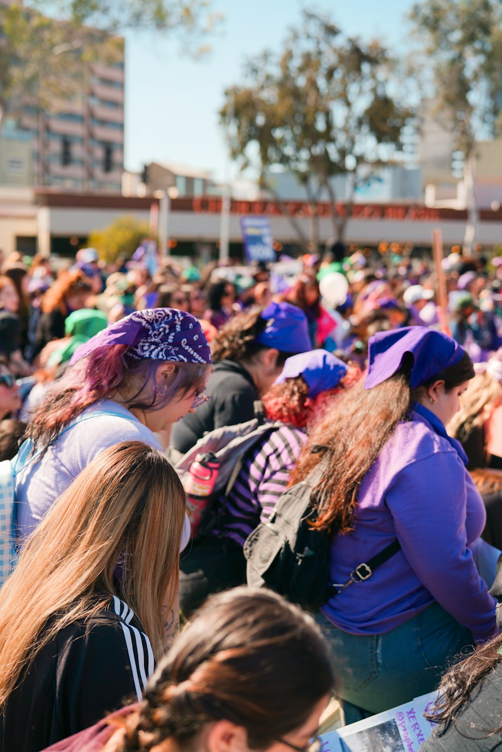 a crowd of people sitting next to each other