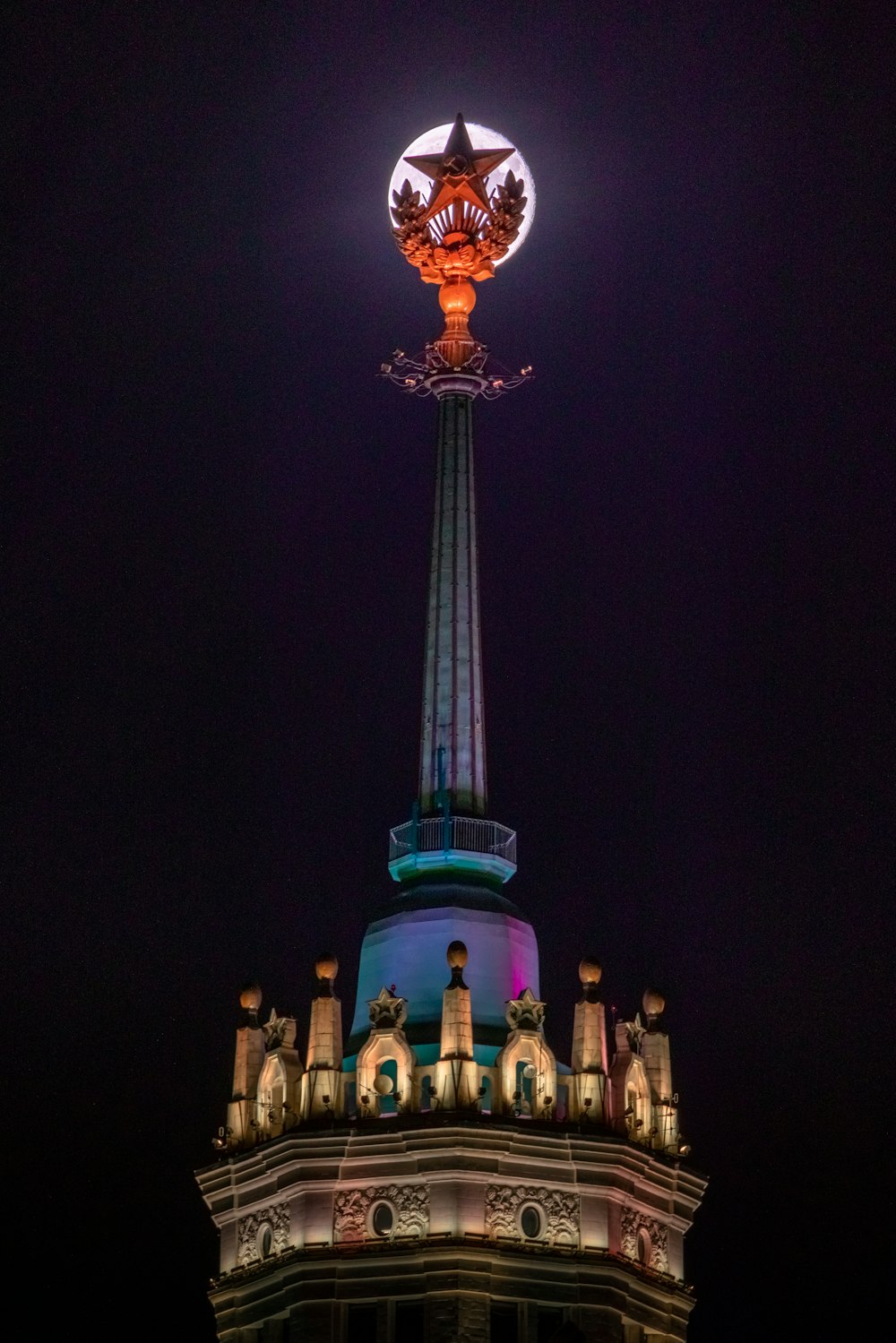 a very tall tower with a clock on top of it