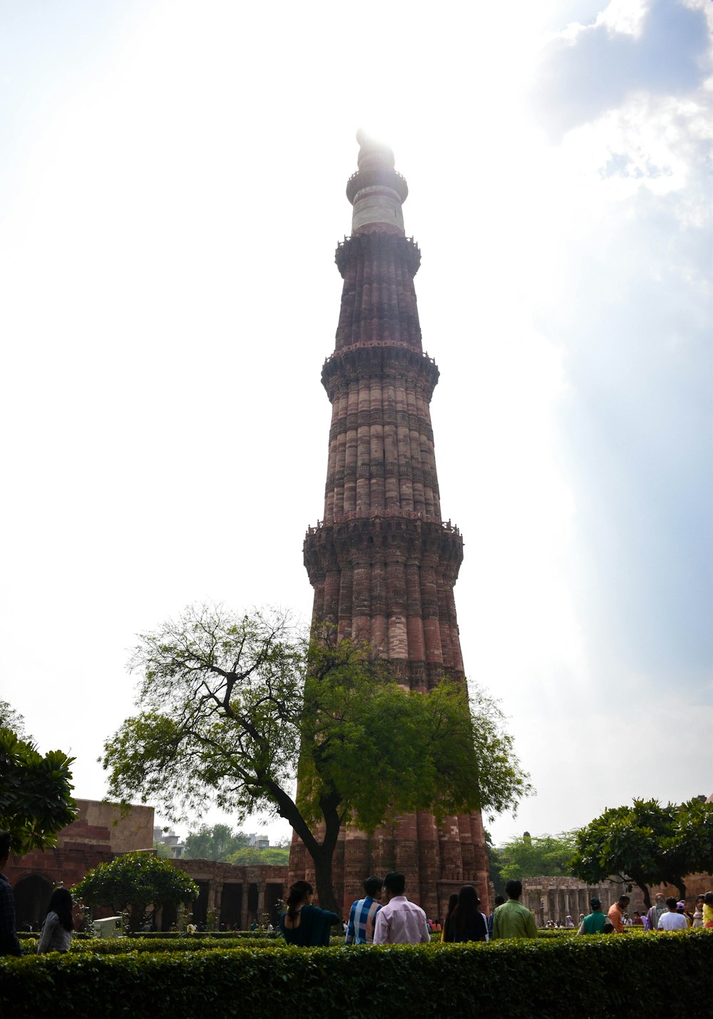 a tall tower with a clock on the top of it