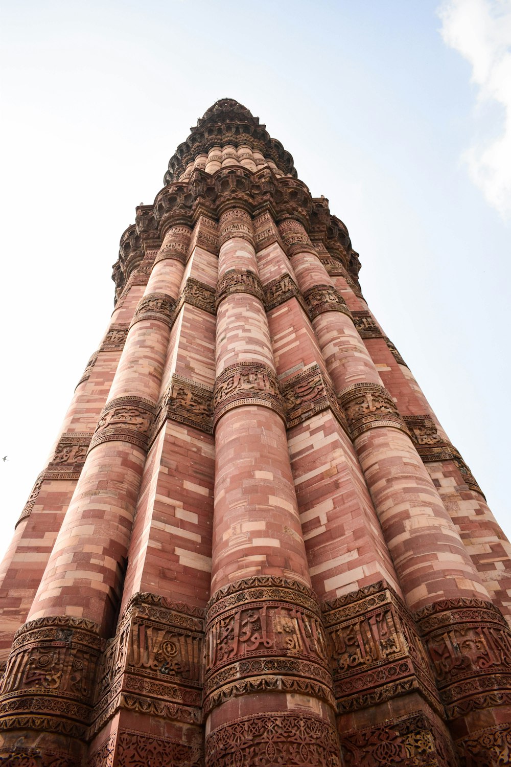 a tall brick tower with a sky background