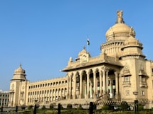 a large building with a clock on the top of it
