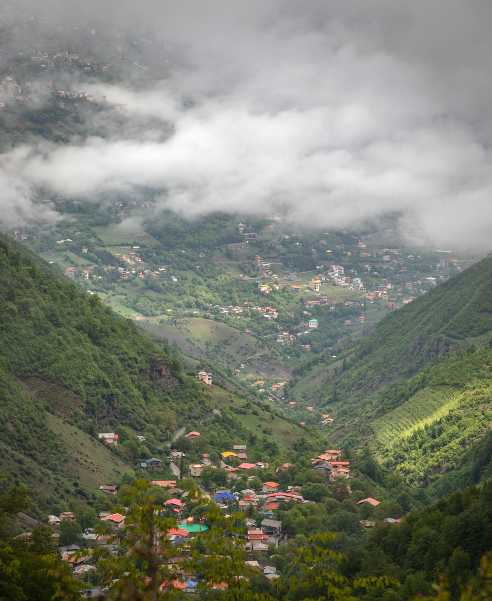 a view of a town nestled in a valley