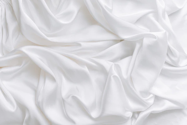 Close-up of white draped fabric texture
