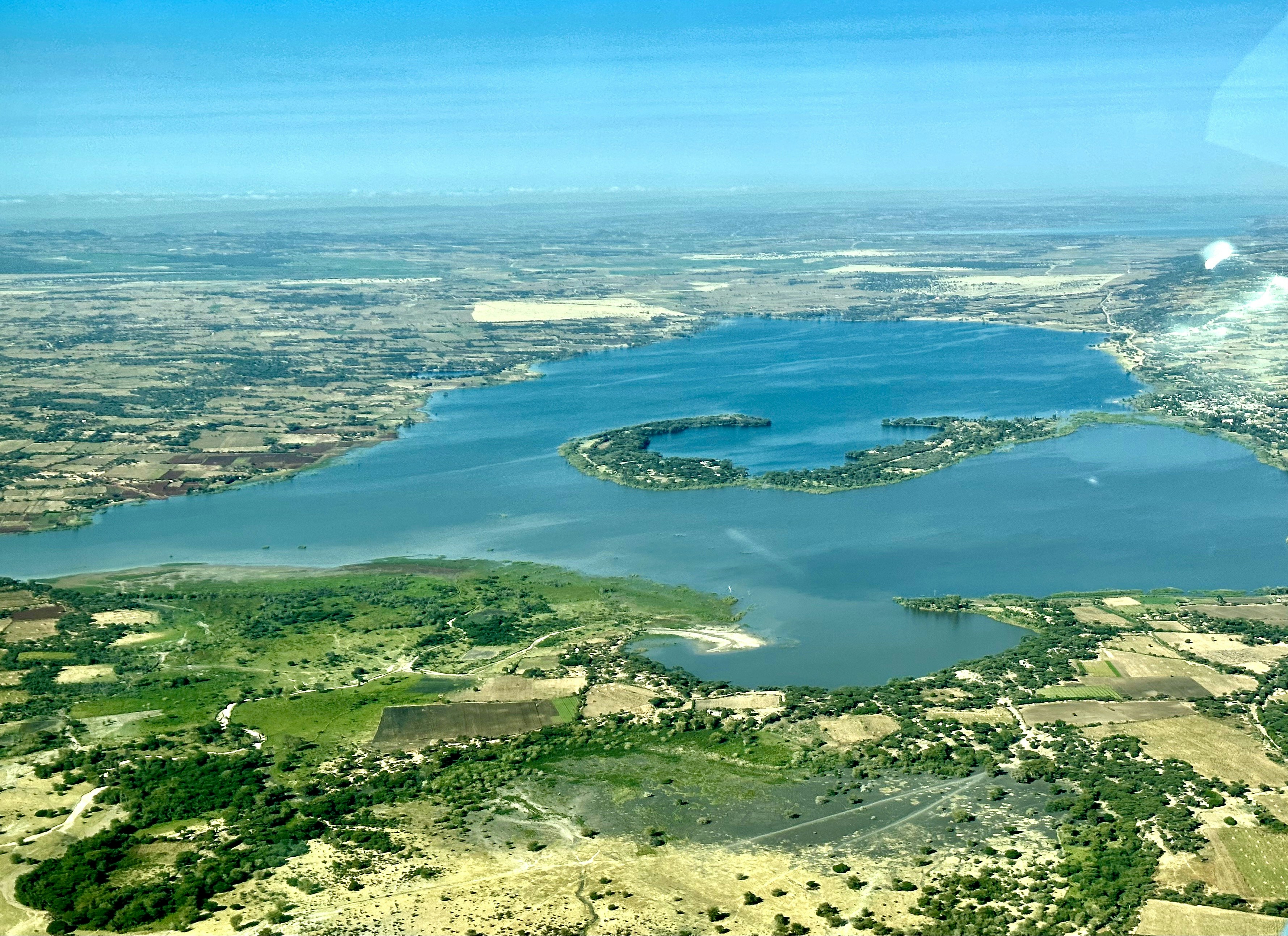 a large body of water surrounded by land