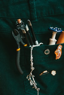 a pocket full of assorted items including a pair of scissors