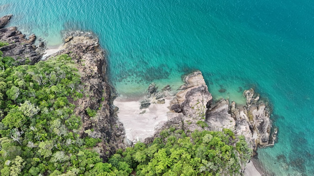 an aerial view of a beach and a body of water