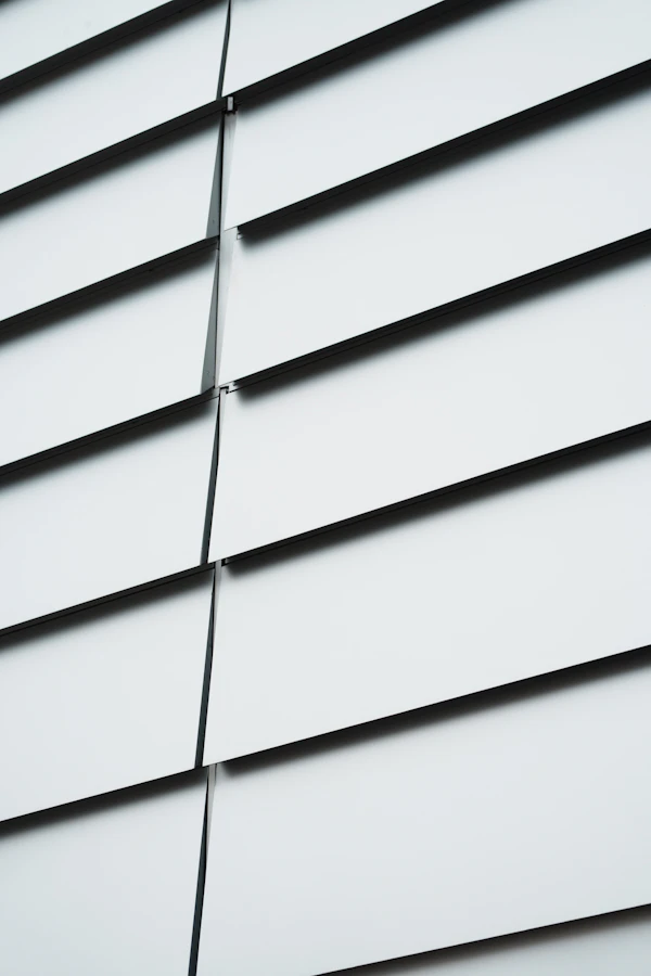Choosing Exterior Materials: a close up of a building with a white roof