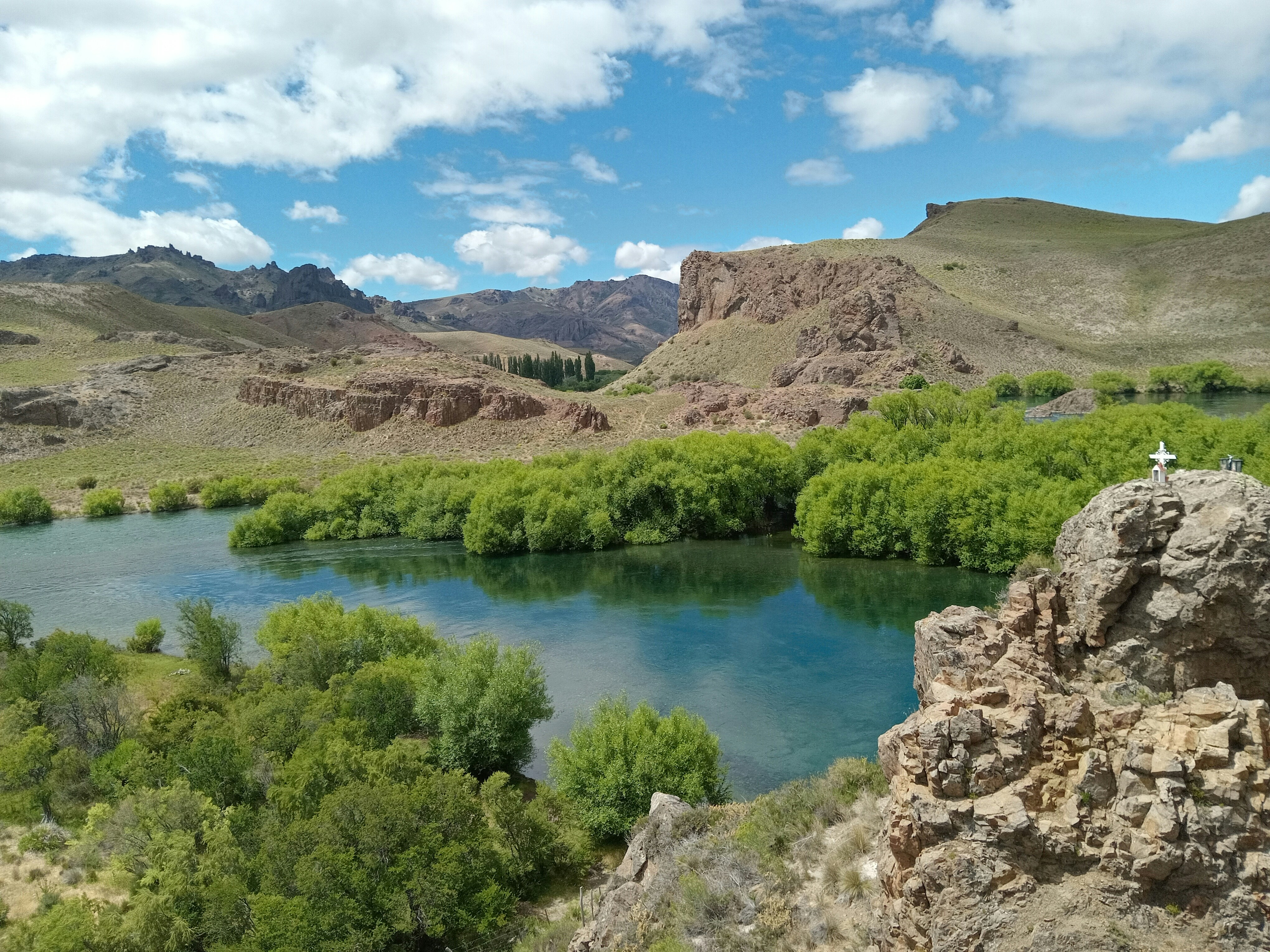 a lake in the middle of a mountain range
