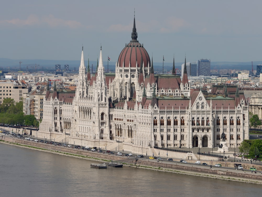 a large white building with a red dome