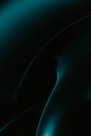 a black and green abstract background with curves
