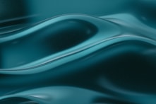 a close up view of a blue liquid background