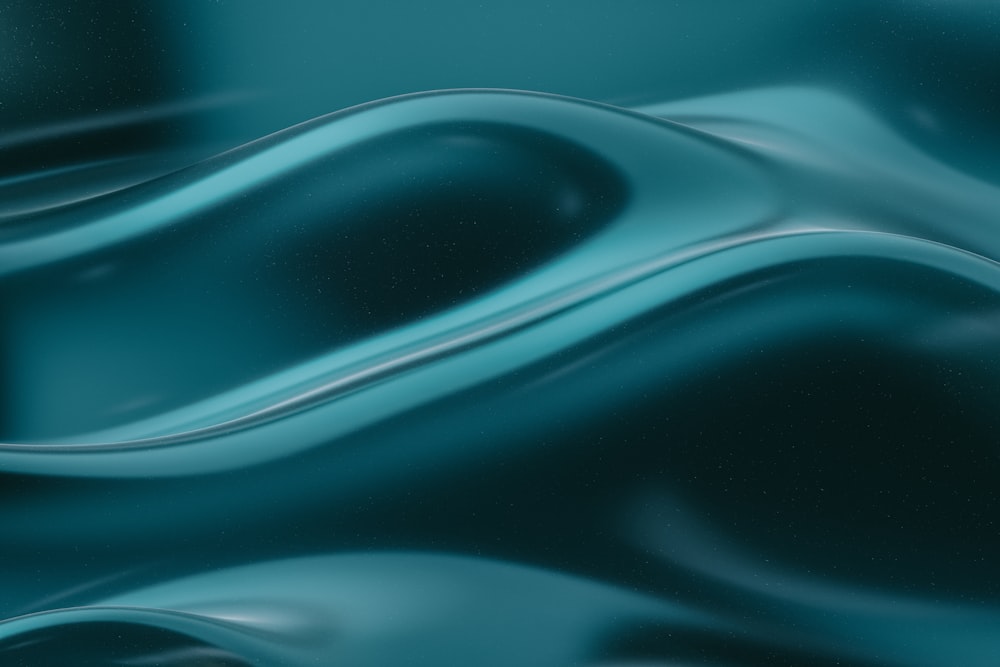 a close up view of a blue liquid background
