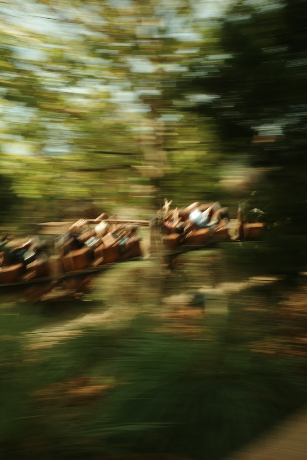 a blurry photo of a carnival ride in motion