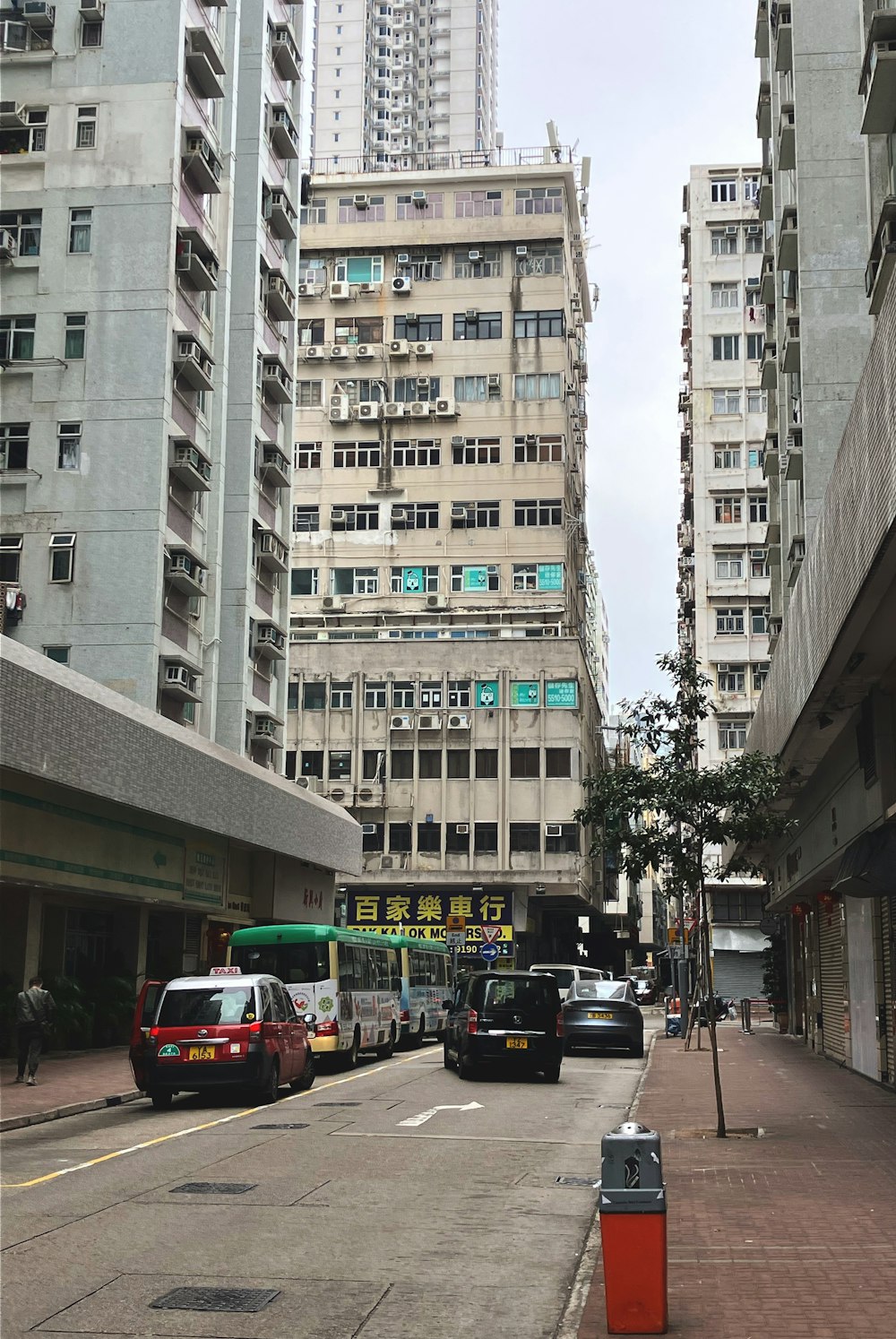 a city street filled with lots of tall buildings