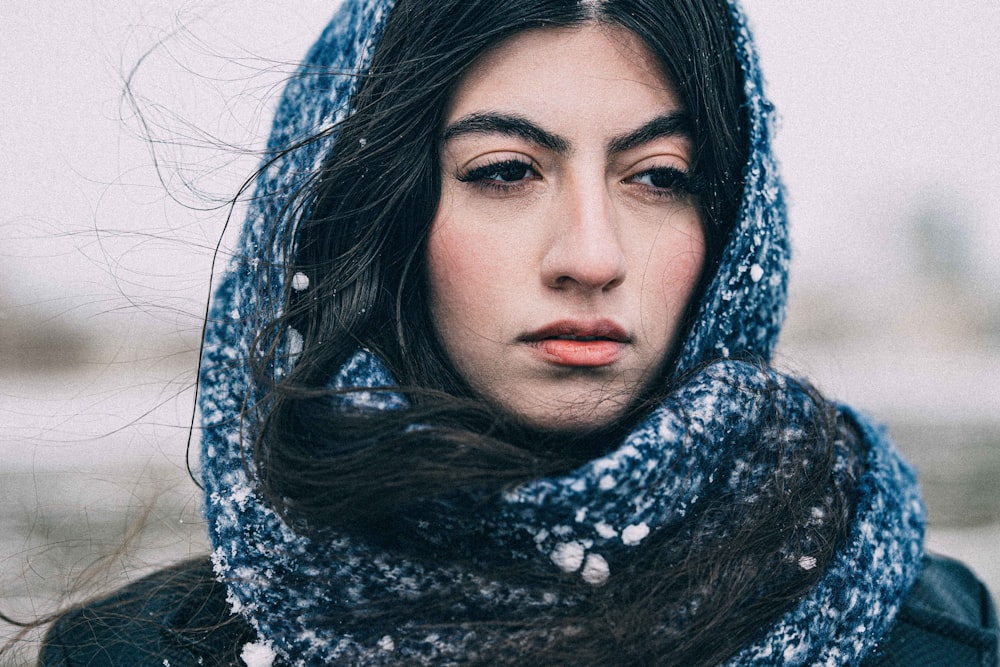 a woman with a scarf around her head