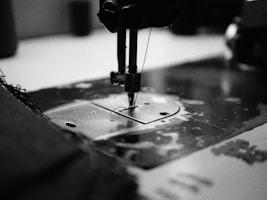 a close up of a sewing machine on a table