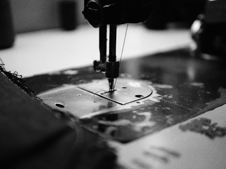 a close up of a sewing machine on a table