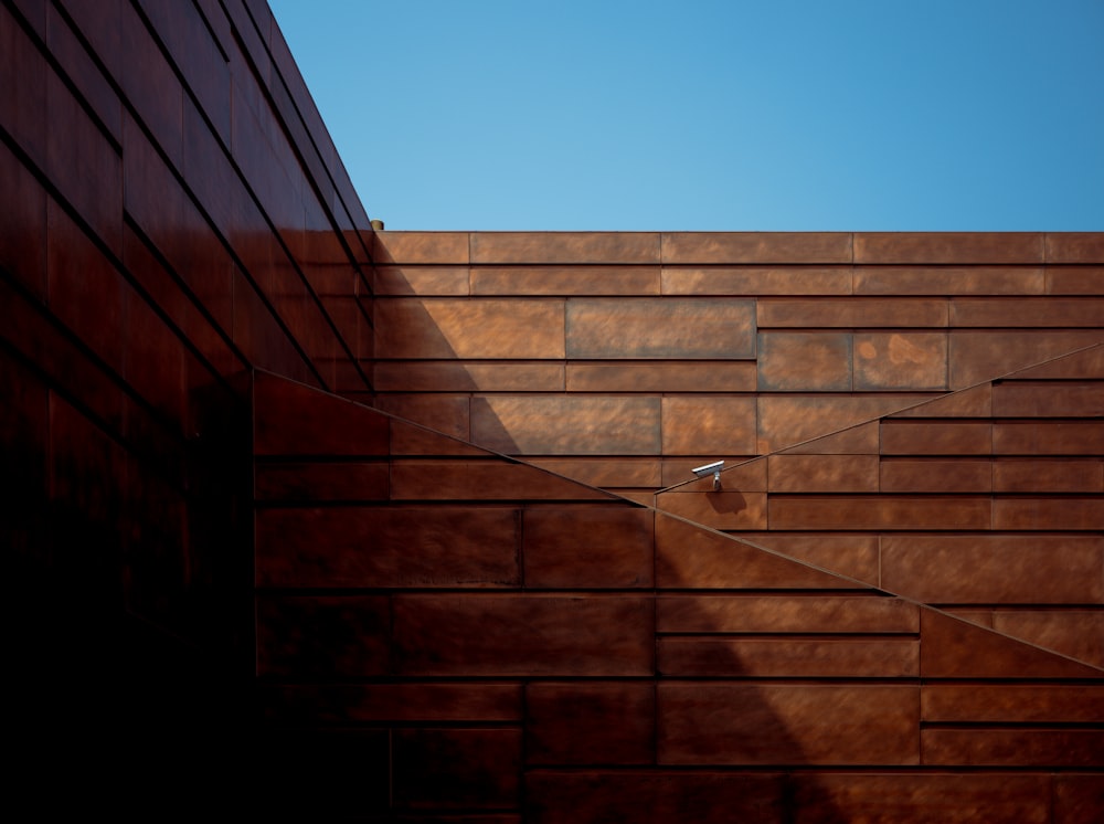 a close up of a building with a sky background