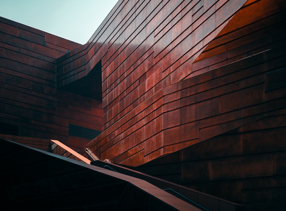 a building that has a very large wooden structure on top of it