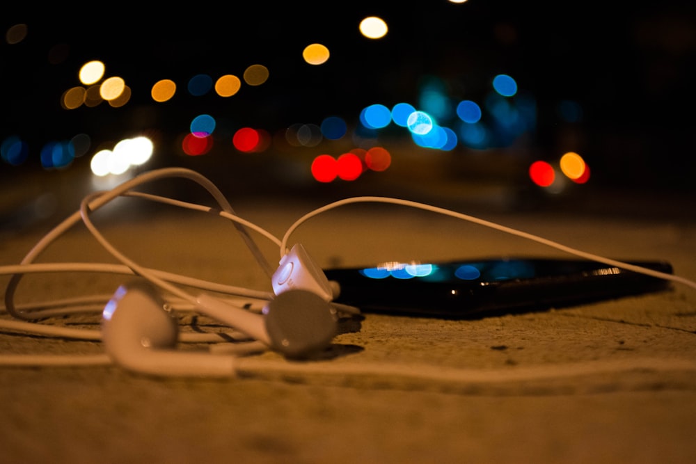 a pair of headphones laying on the ground