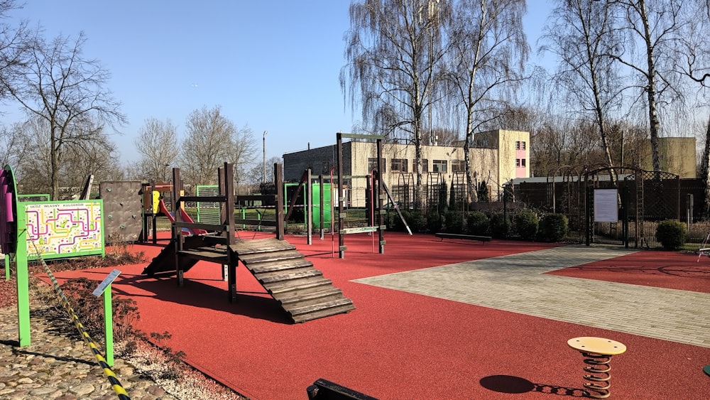 a children's play area with a slide and climbing frame