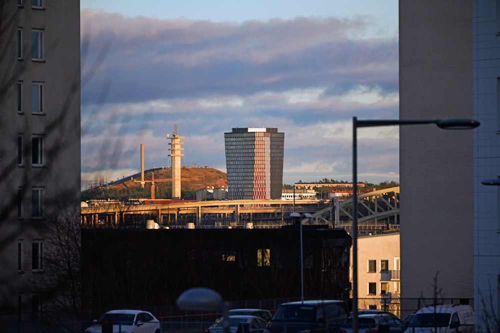 a view of a city with a bridge in the background