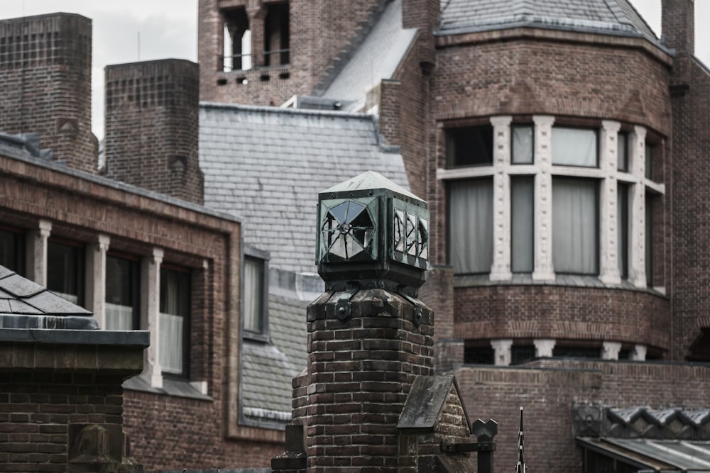 a clock tower on top of a brick building