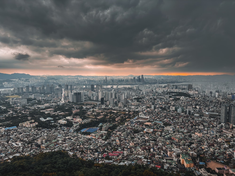 a view of a city from the top of a hill