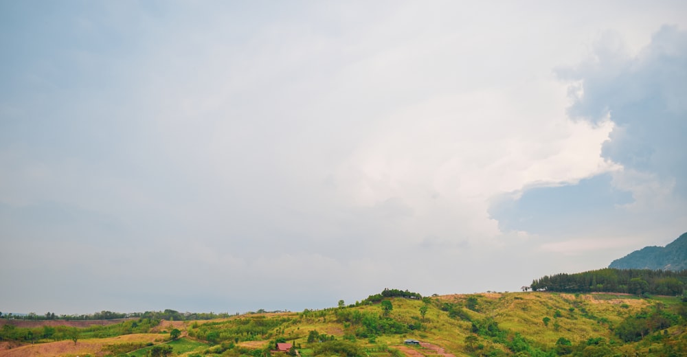 a hill with a house on top of it