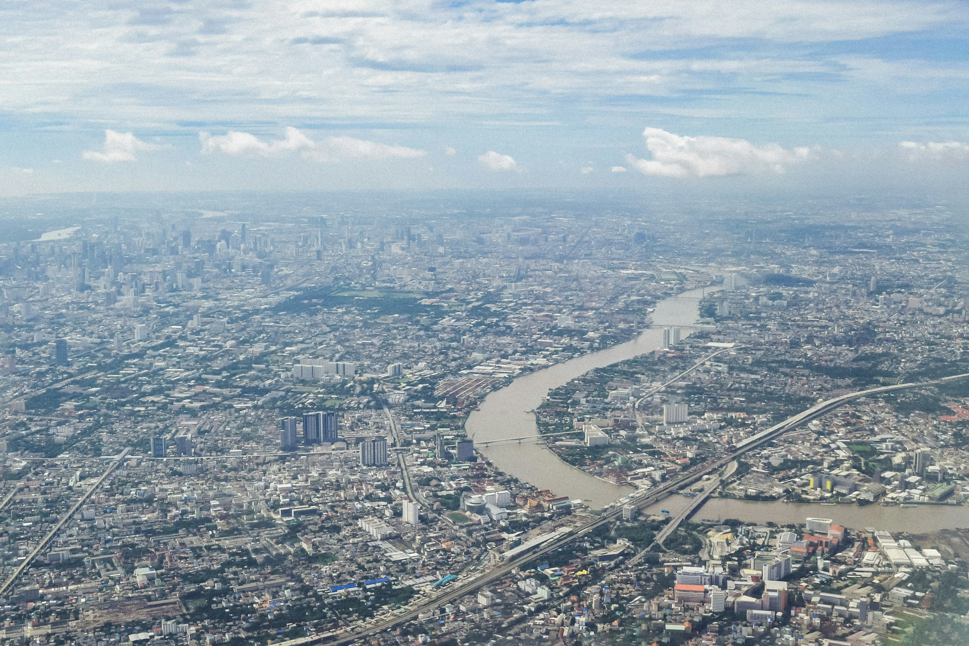an aerial view of a city and a river