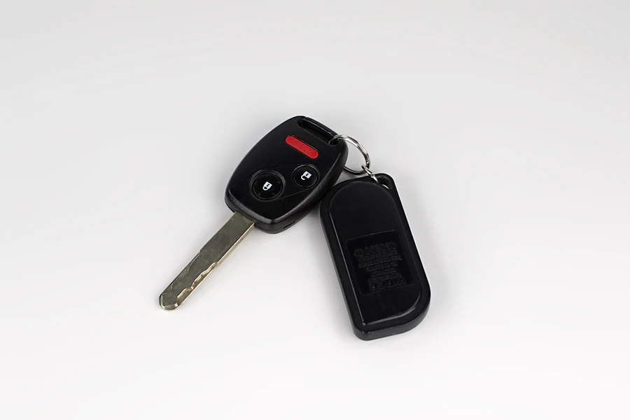 Car key with electronic remote control fob, representing transponder key programming at 24hr Locksmith Solution Norcross