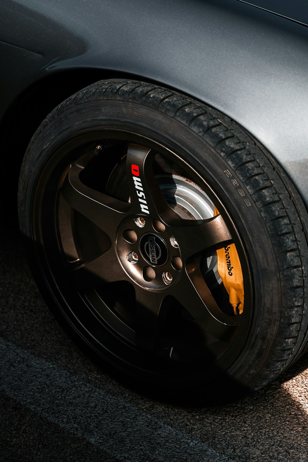 a close up of a tire on a car