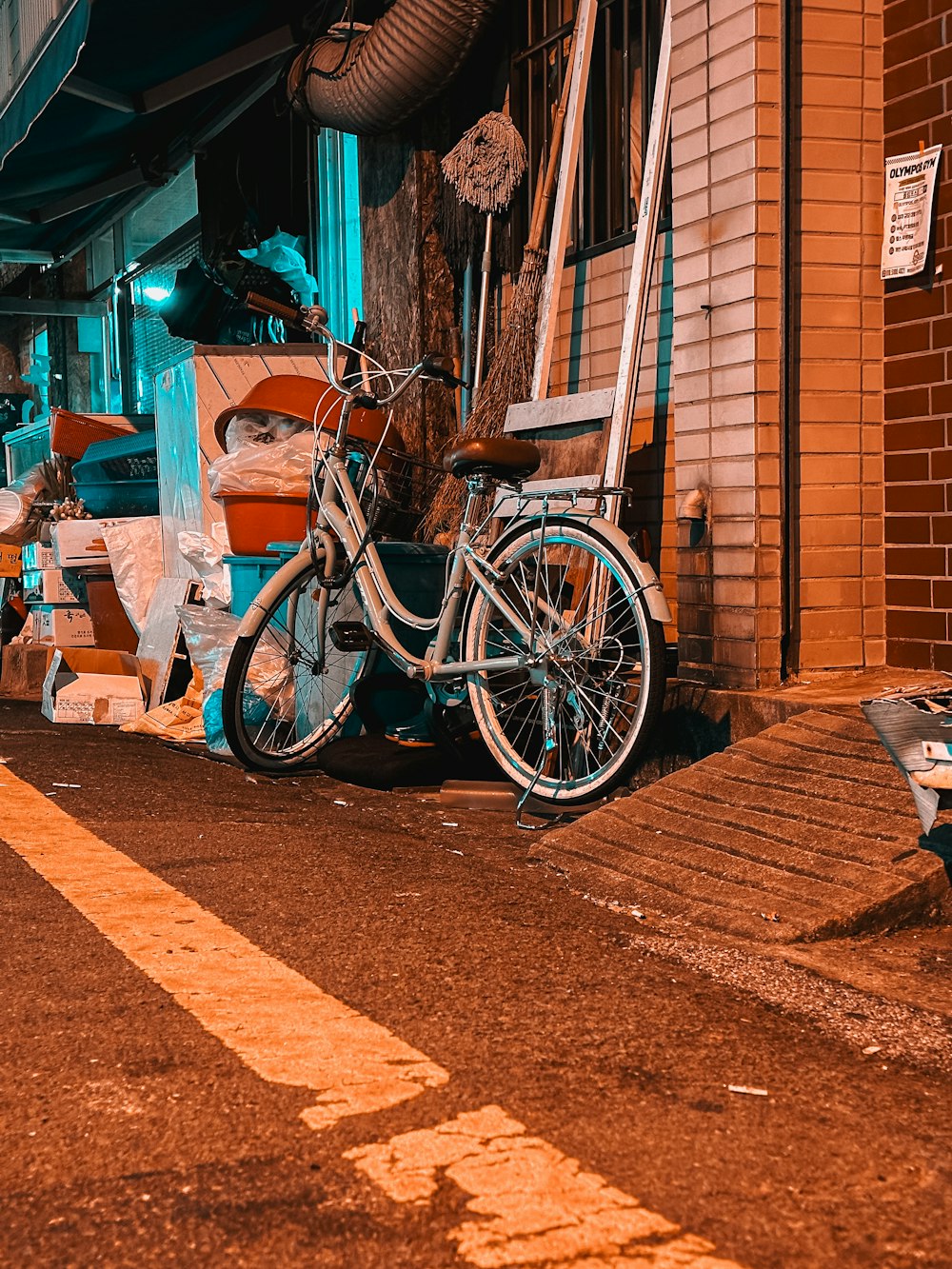 a bike is parked next to a building