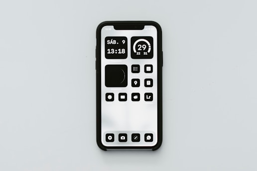 a remote control sitting on top of a white surface