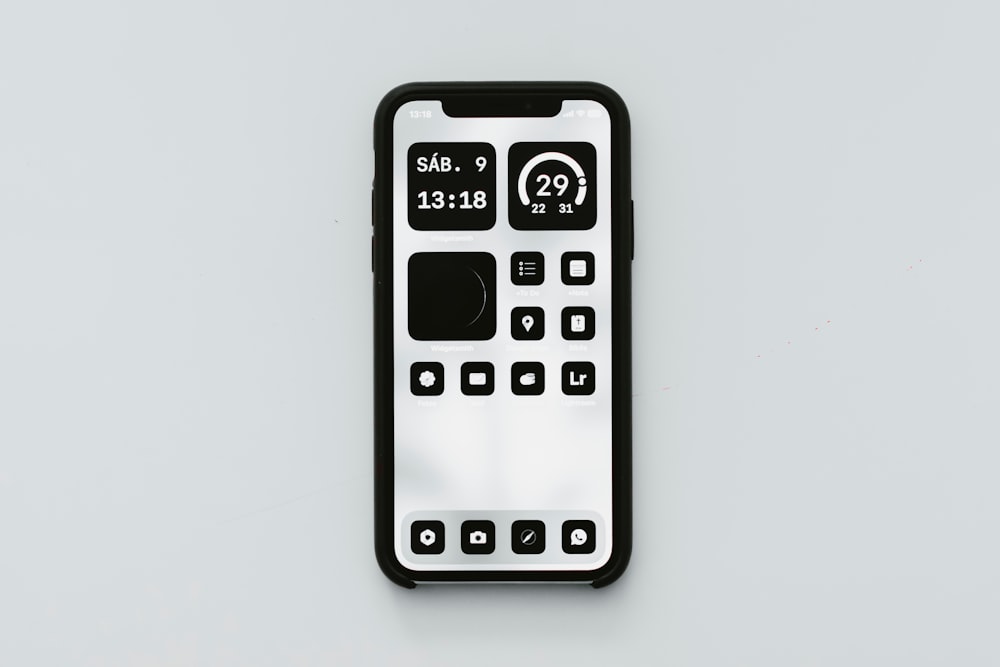 a remote control sitting on top of a white surface