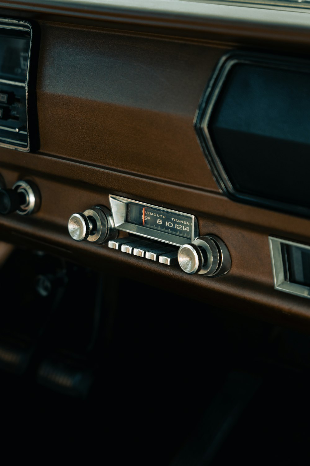 a close up of a radio in a car