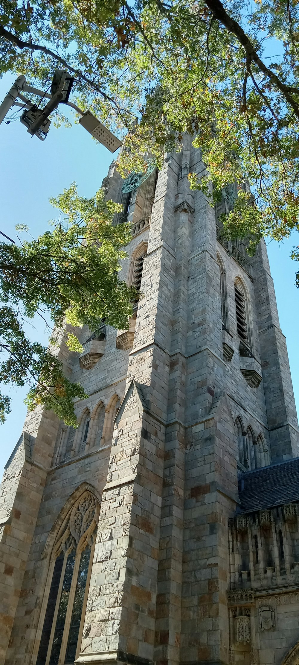 a tall tower with a clock on the top of it