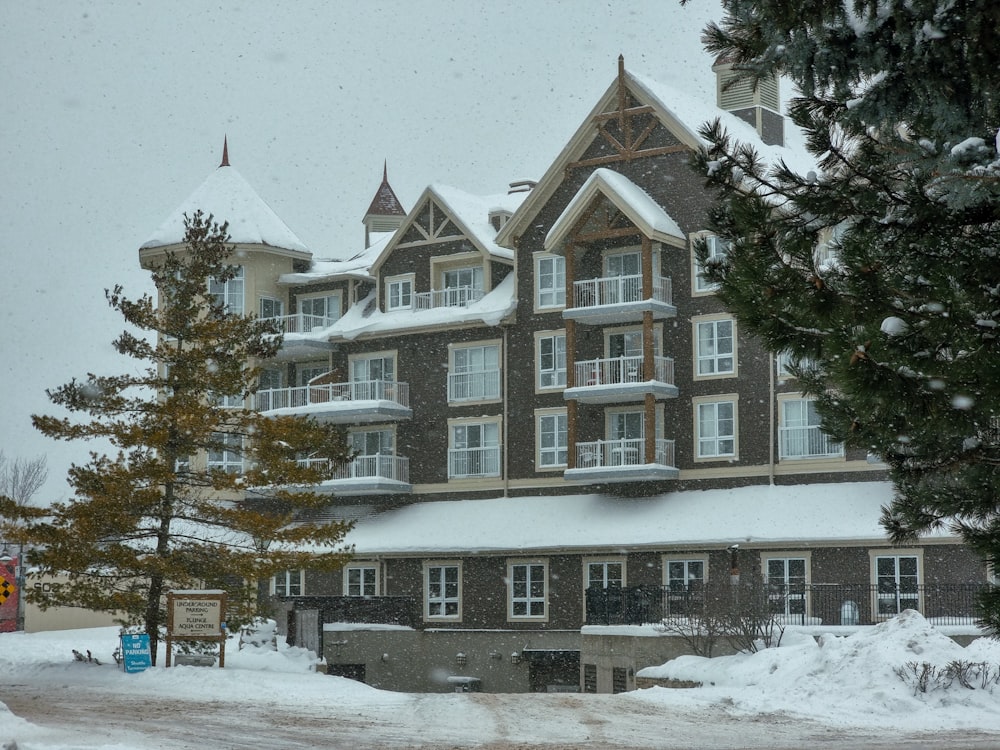 a large building with a lot of windows in the snow