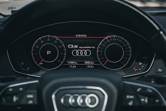 the dashboard of a car with a digital display
