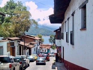 a street with cars parked on both sides of it
