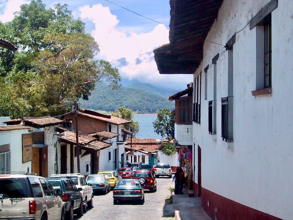 a street with cars parked on both sides of it