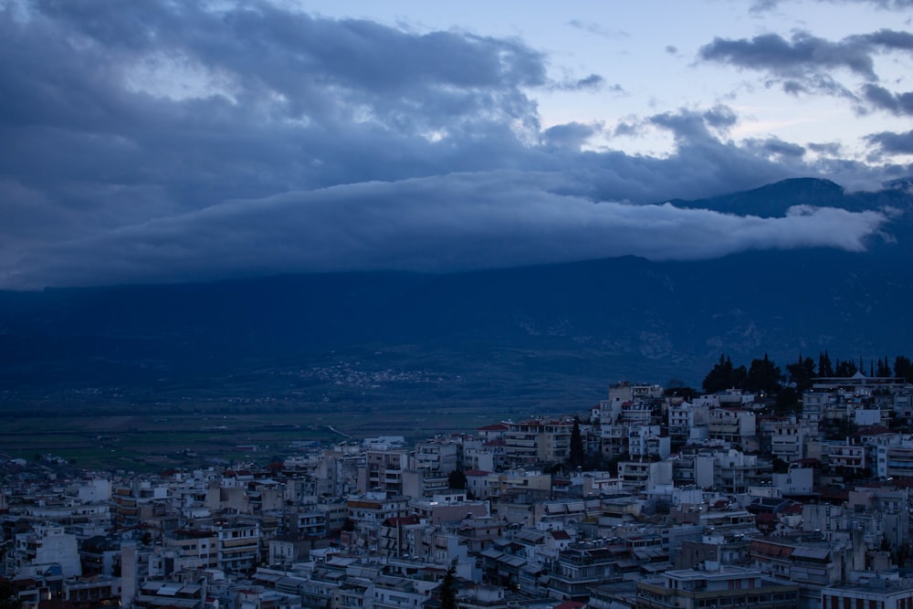 a view of a city with a mountain in the background