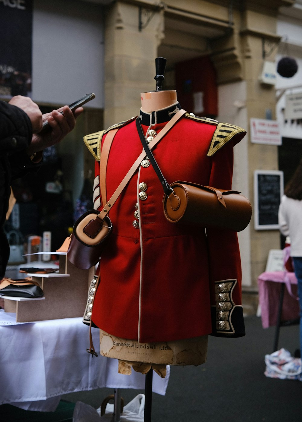 a red uniform on display in a store