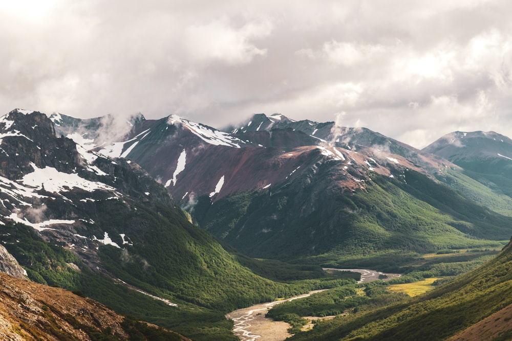 a mountain range with a river running through it