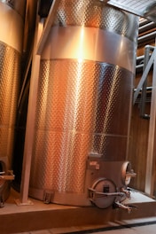 a large metal tank sitting inside of a building