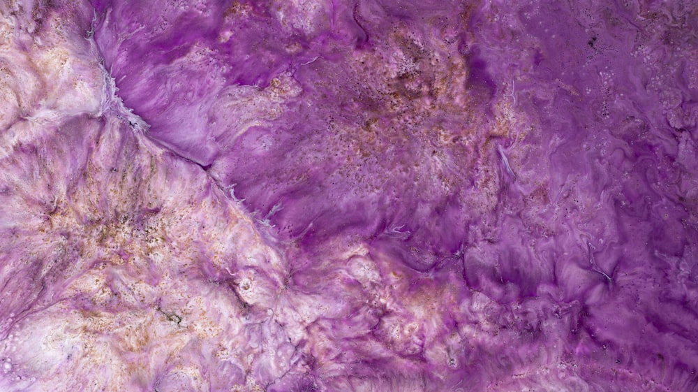 a close up of a purple marble texture