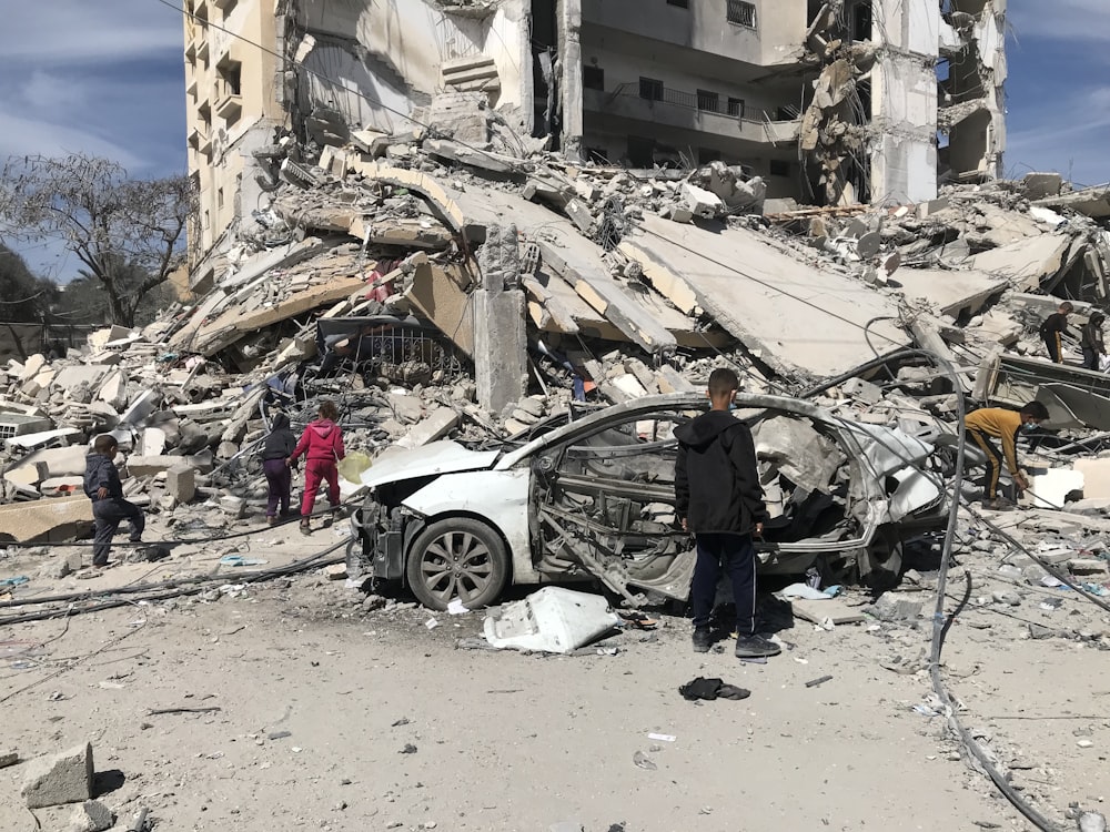 a car that is sitting in the middle of a rubble