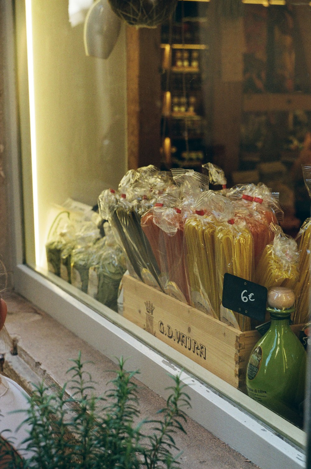 a store window filled with lots of packaged food