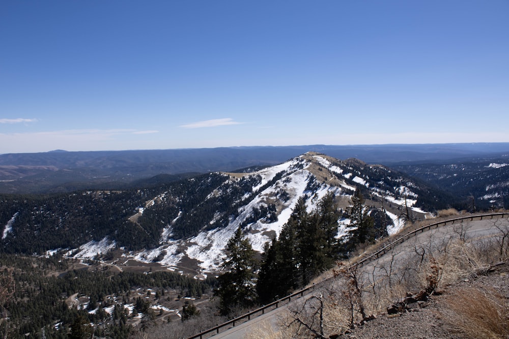 a view of a mountain with snow on it