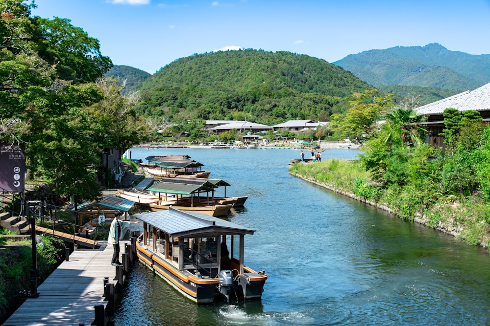 a river with several small boats on it